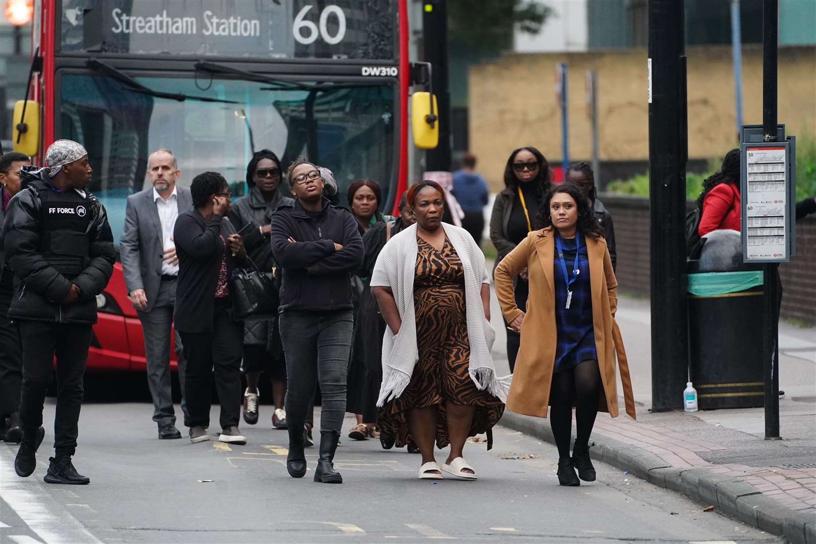 Family and friends of Elianne Andam at the scene in Croydon (James Manning/PA)