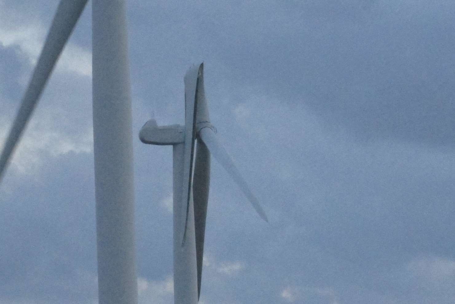 The wind turbine blade has bent back