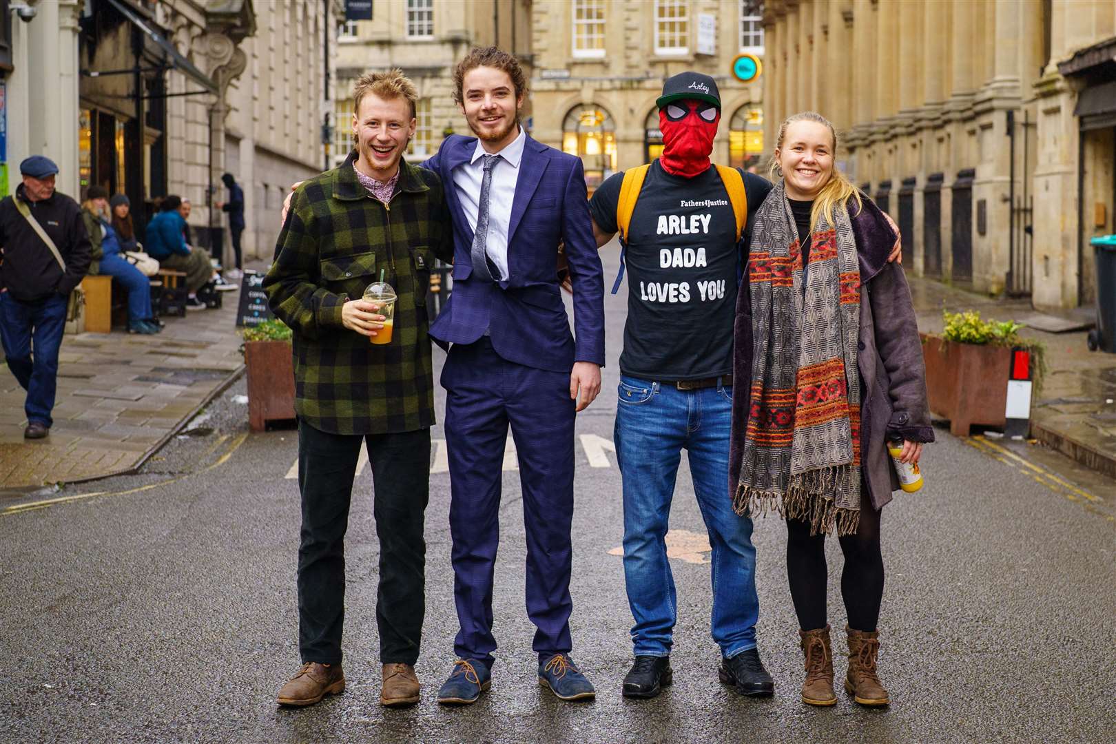 Milo Ponsford, left, Sage Willoughby, second left, Jake Skuse, in mask, and Rhian Graham outside Bristol Crown Court (Ben Birchall/PA)