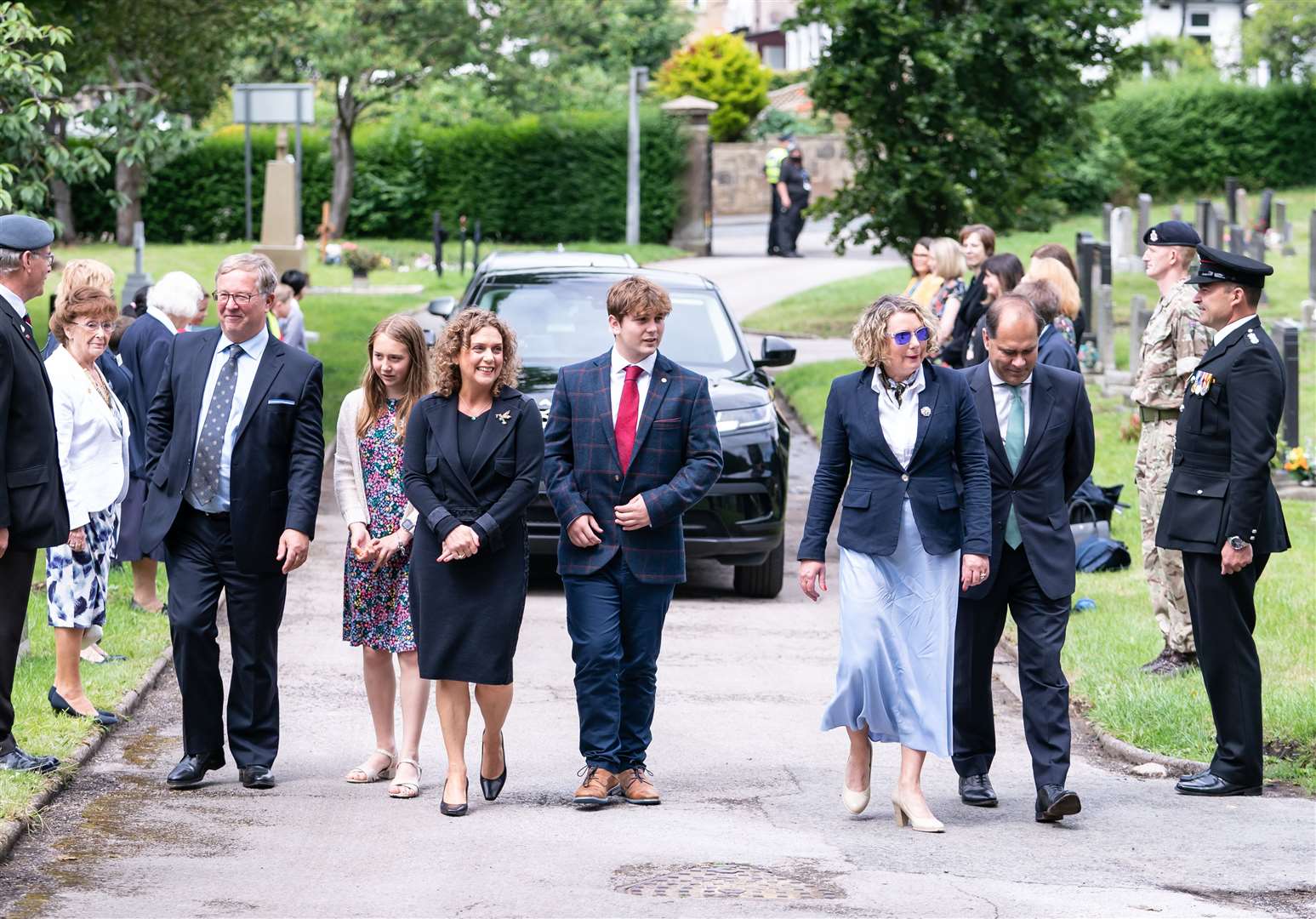 Relatives of Captain Sir Tom Moore (left to right) Colin Ingram-Moore (son-in-law), Georgia Ingram-Moore (granddaughter), Hannah Ingram-Moore (daughter), Benjie Ingram-Moore (grandson), Lucy Teixeira (daughter) and Tom Teixeira (son-in-law) (Danny Lawson/PA)