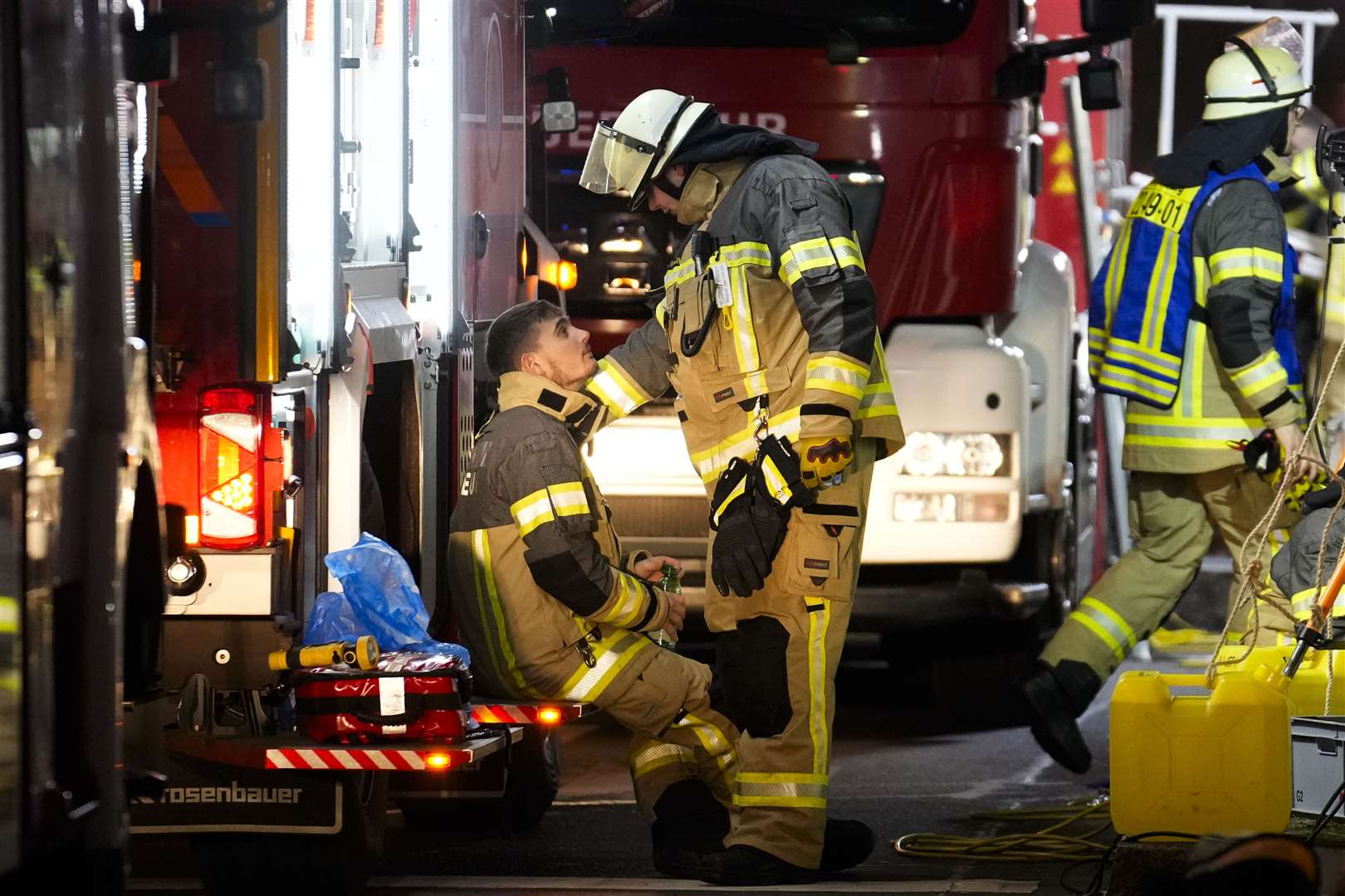 Emergency services work in a cordoned-off area near a Christmas Market, after a car drove into a crowd in Magdeburg, Germany, on Friday (Ebrahim Noroozi/AP)