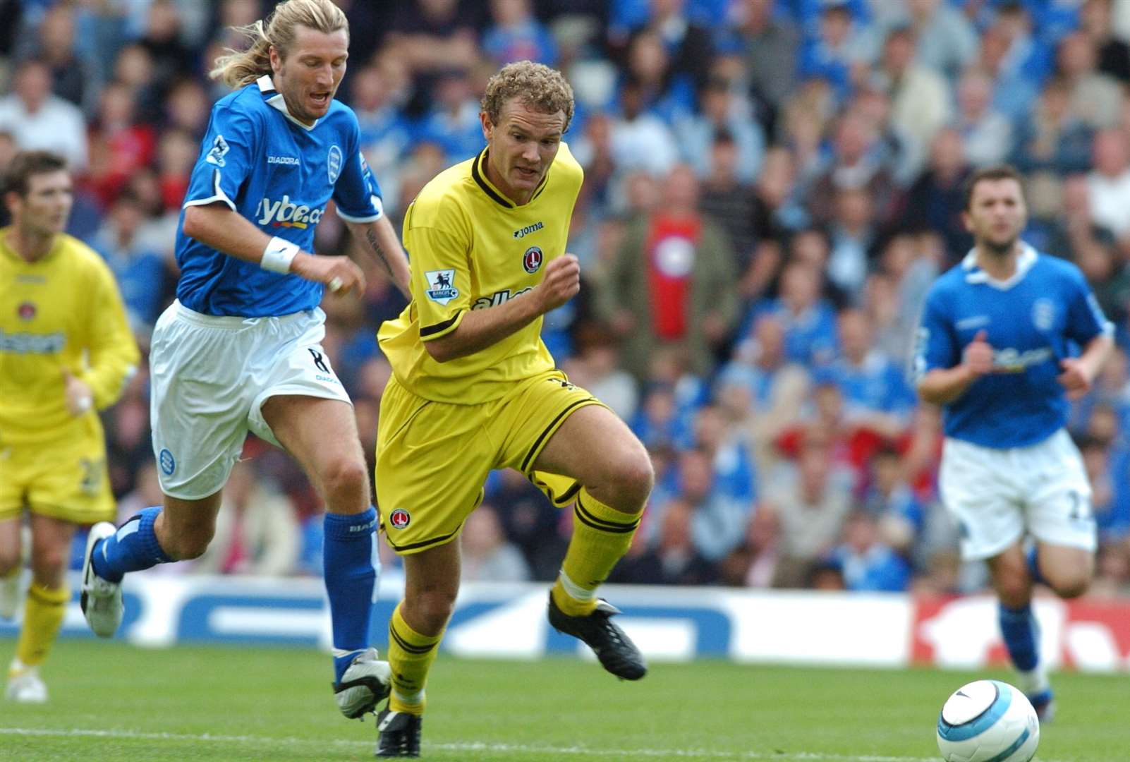 Robbie Savage, left in blue, in his playing days for Birmingham. Picture: Matthew Walker