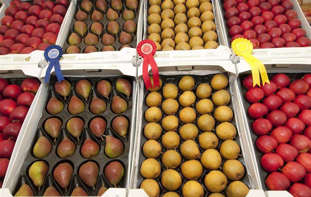 A colourful stand showing off the very best local fruit