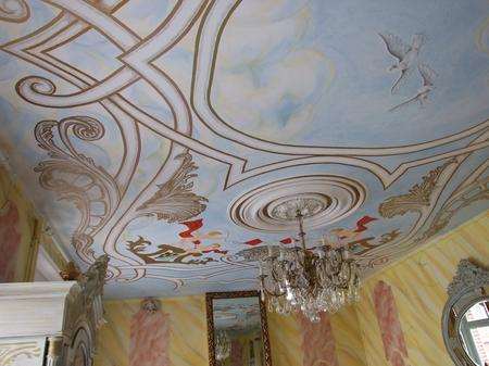 One of the hand-painted ceilings