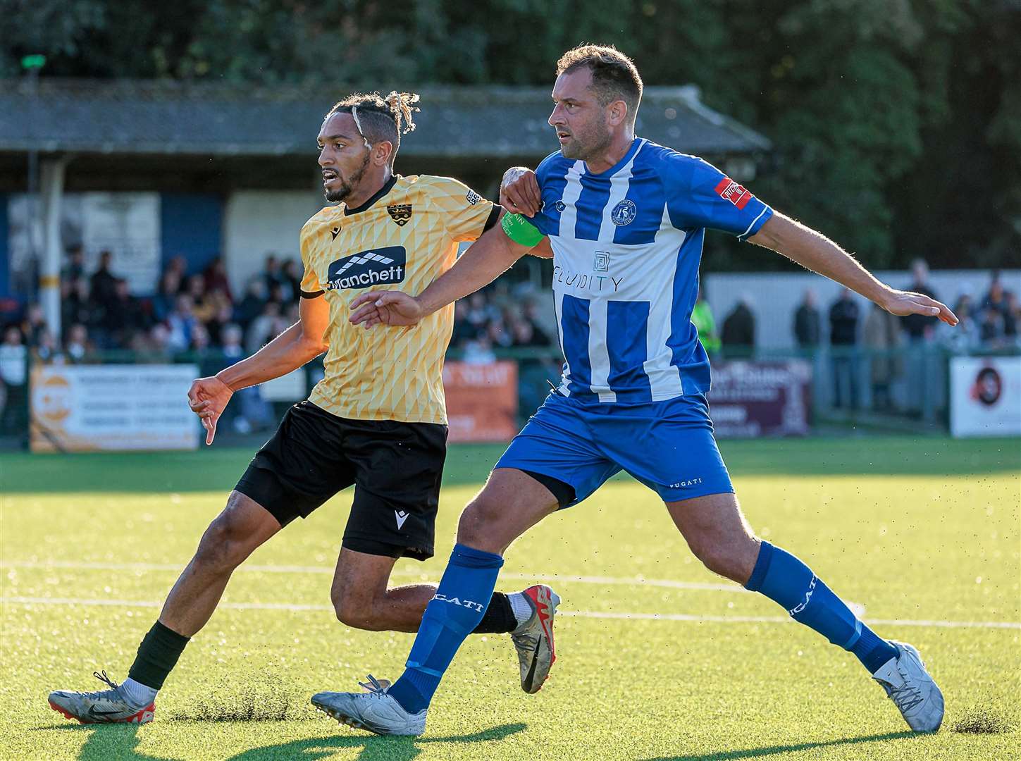 Liam Friend, Herne Bay's captain, holds off Maidstone's Matt Bentley in their home FA Cup defeat earlier in the season. Picture: Helen Cooper