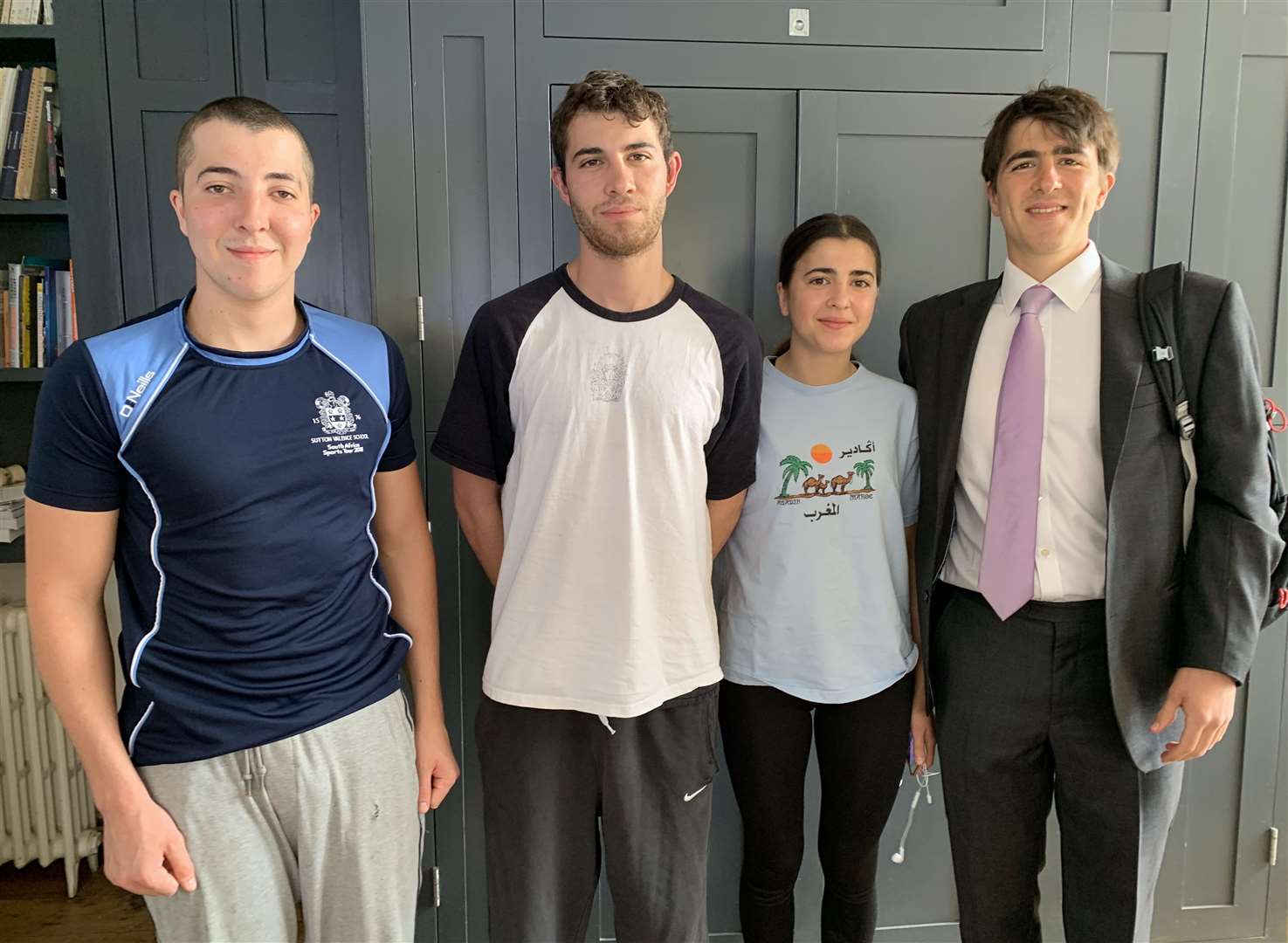 Tom Lazarides, left, with siblings George, Kate and Theo