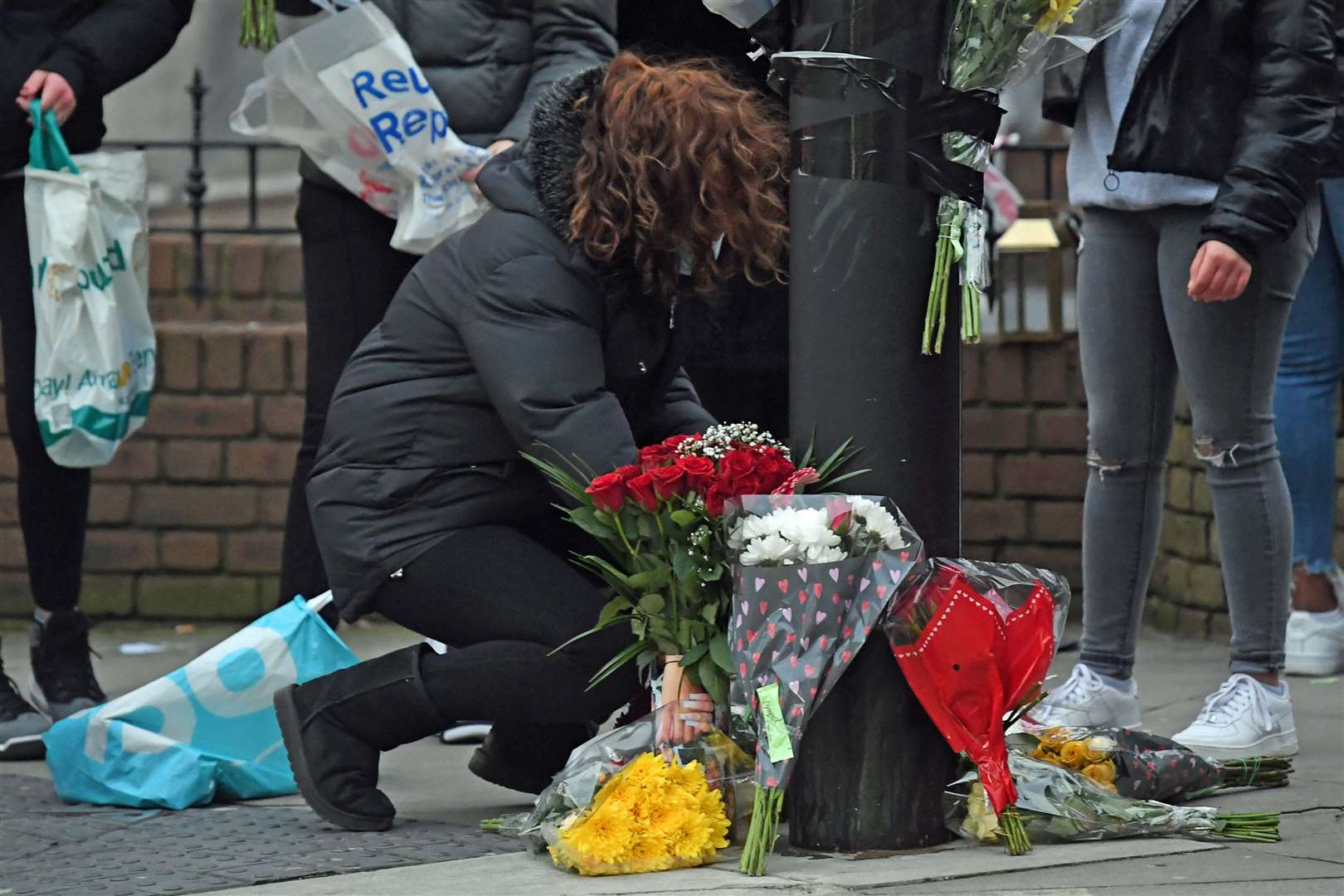 Flowers are laid at the site of the incident (Kirsty O’Connor/PA)