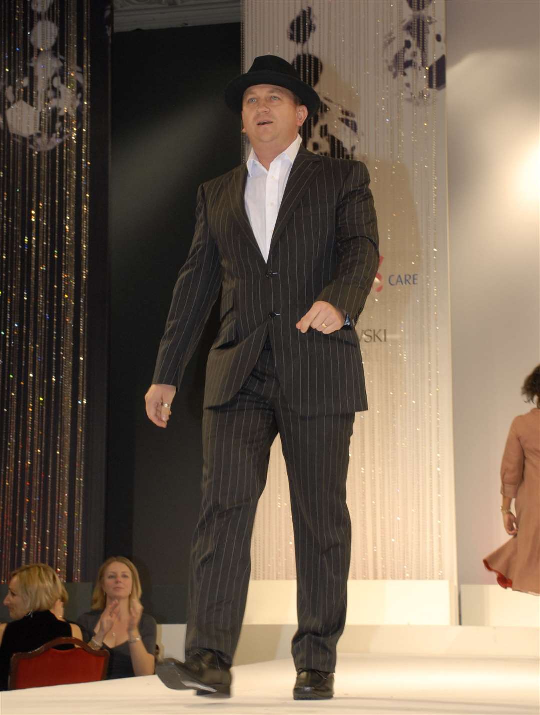 Mr Weaver struts his stuff on the catwalk in the annual Breast Cancer Care fashion show in October 2007. Picture: Stephanie Westacott