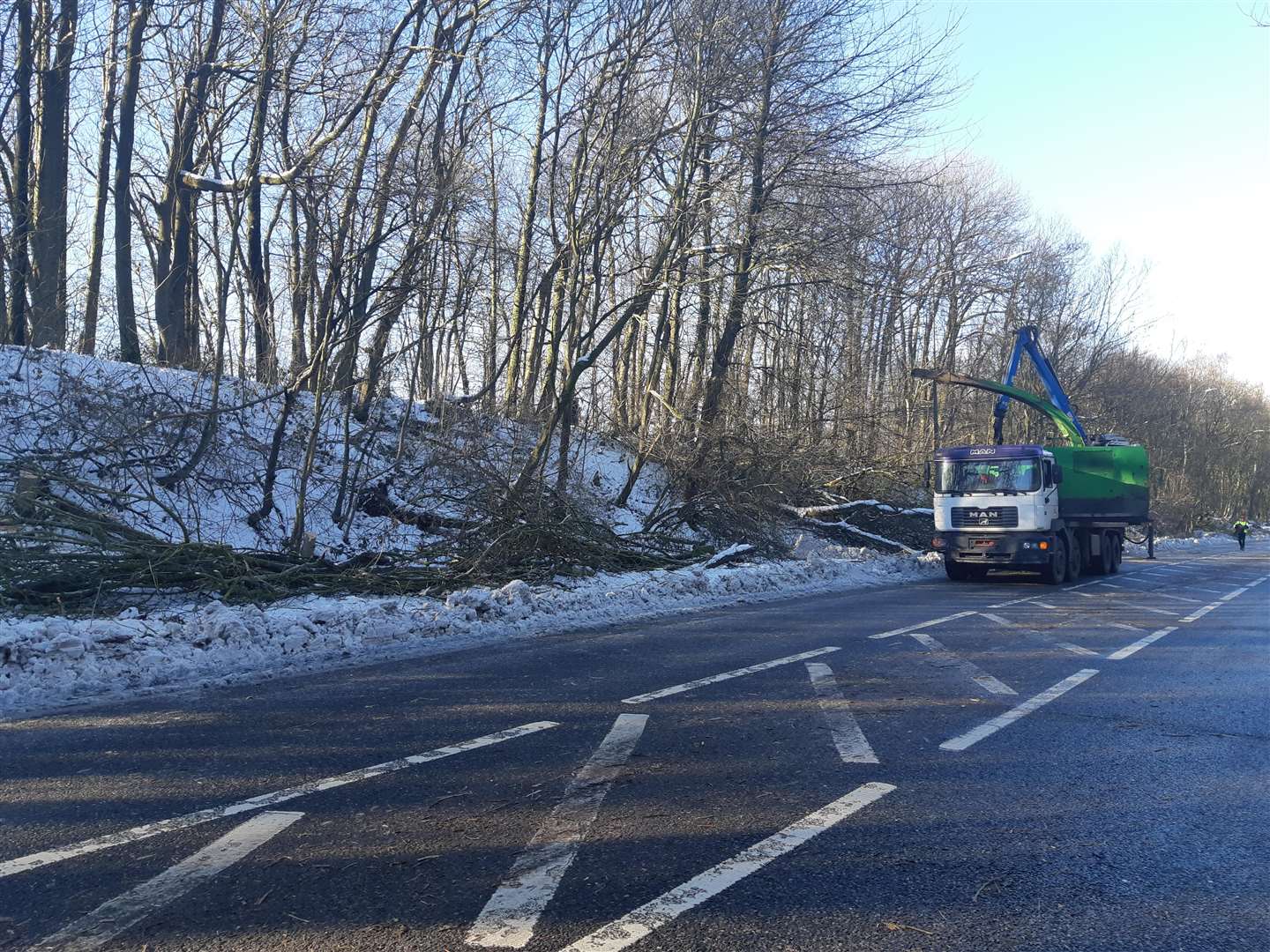 Multiple trucks are on Walderslade Woods Road to shred the debris (6931302)