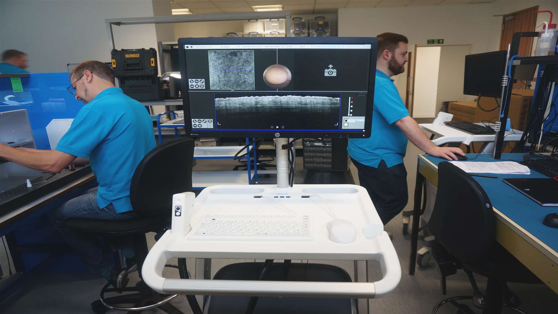 Technicians Rory Kershaw and Matt Jones working onsite in Maidstone on the VivoSight Dx