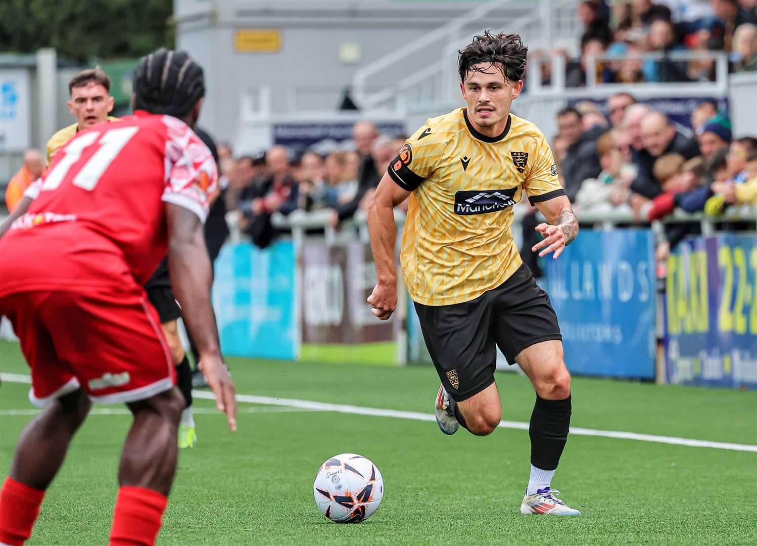 Maidstone attack on the left wing. Picture: Helen Cooper