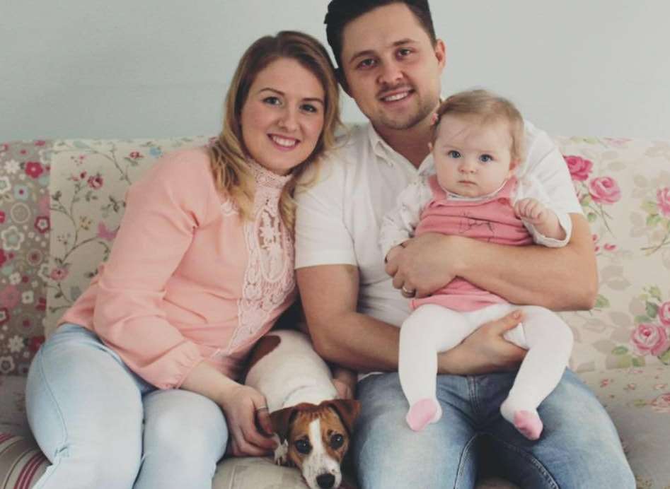 Esther, Chris and daughter Florence with their dog