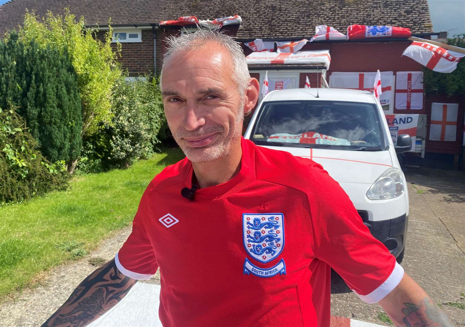 And his home is adorned with more than a dozen England flags ahead of the Euro cup