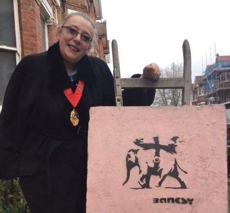 Cllr Jackie Meade with the 'Banksy'