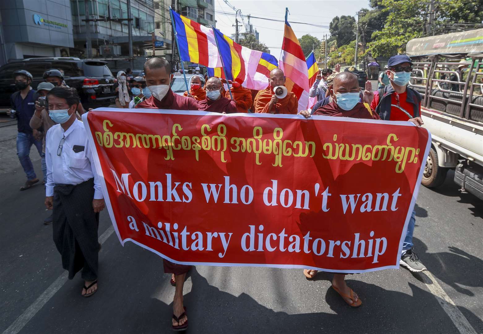 Buddhist monks march during a protest against the military coup in Yangon, Myanmar (AP Photo)