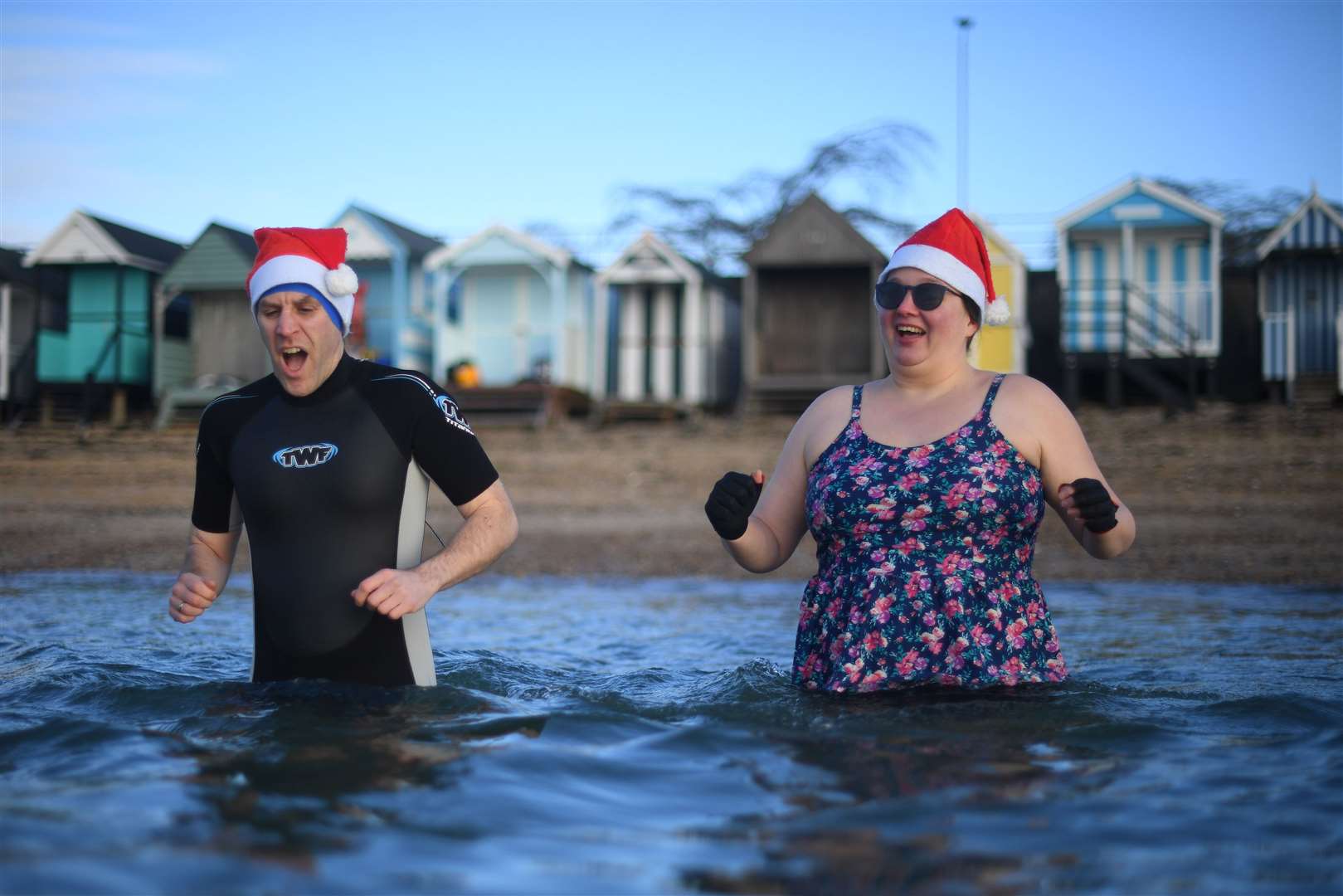 Christmas Day swimmers enter the water in Thorpe Bay, Essex (Victoria Jones/PA)