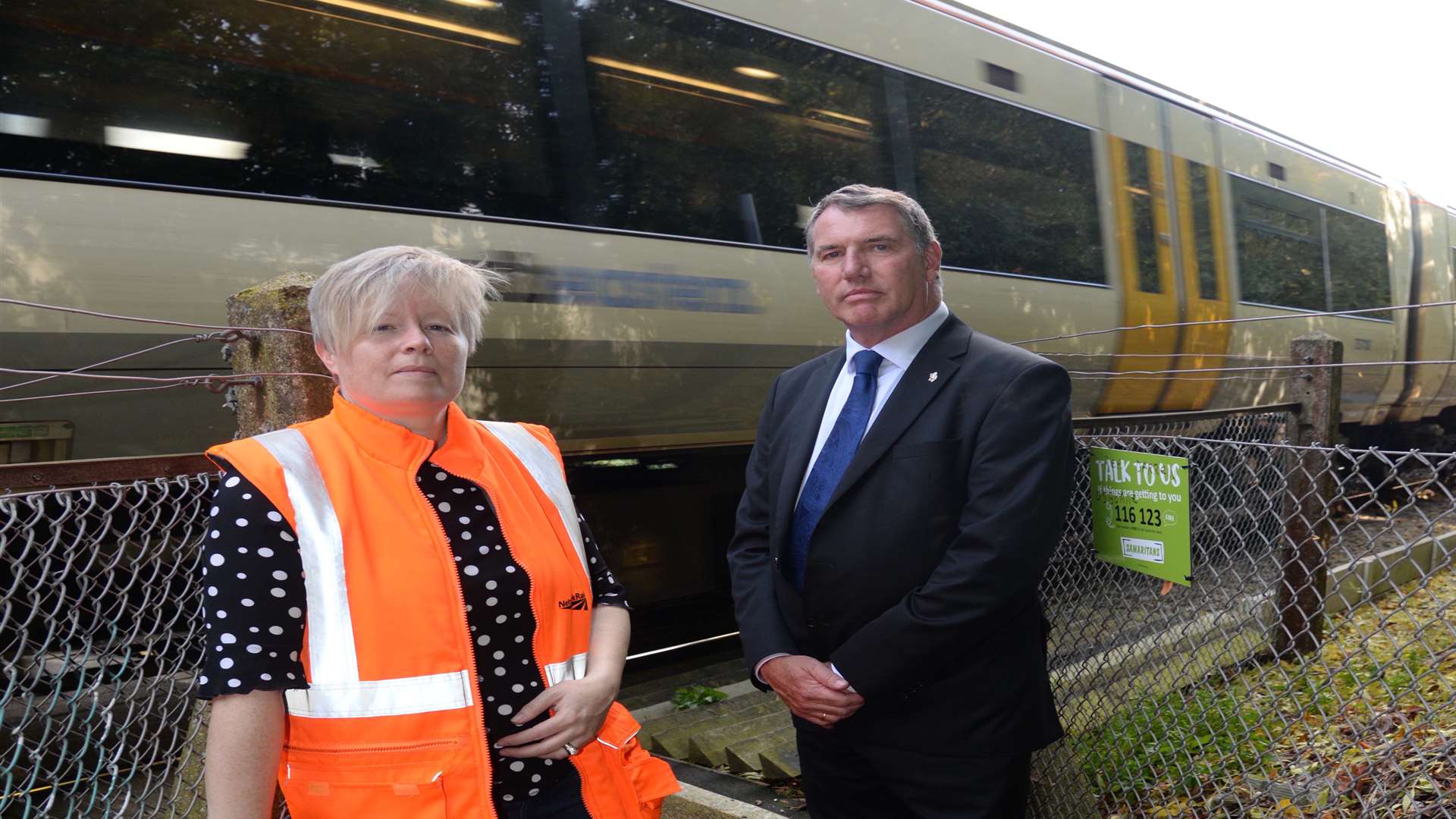 Nicola Dooris, Network Rail's community safety officer and Cllr Mike Whiting at the crossing