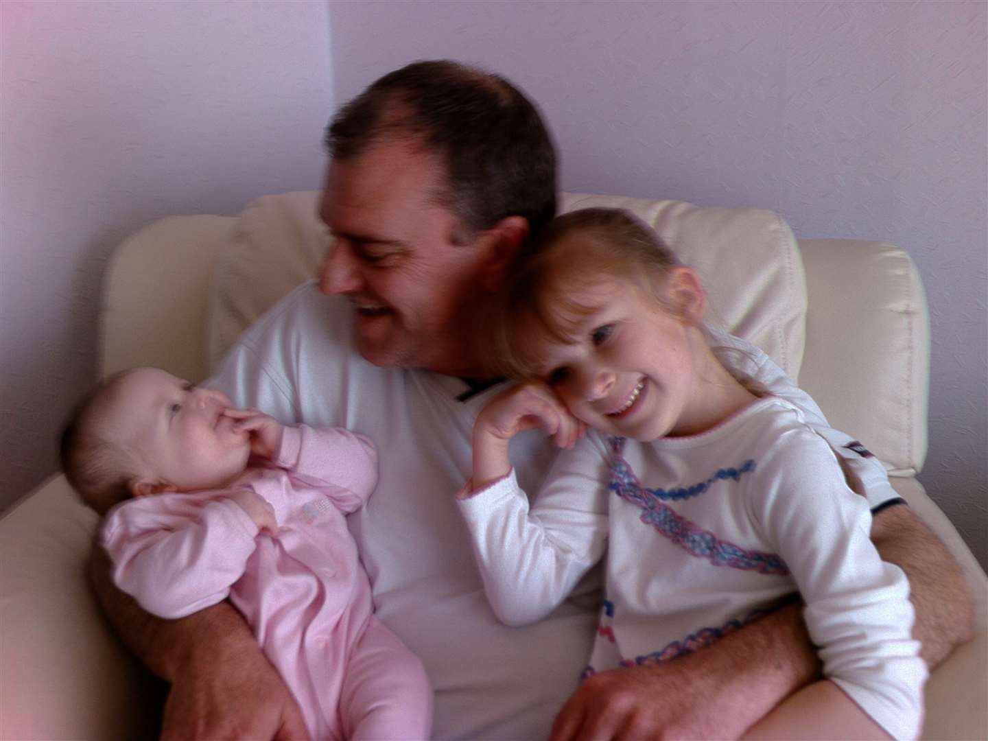 Peter and two of his grandchildren, Abigail and Grace in 2006