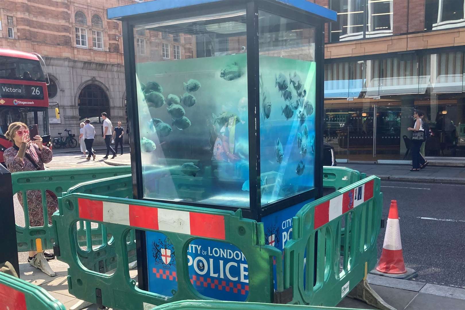 Banksy artwork showing piranhas in a police box moved to keep it safe