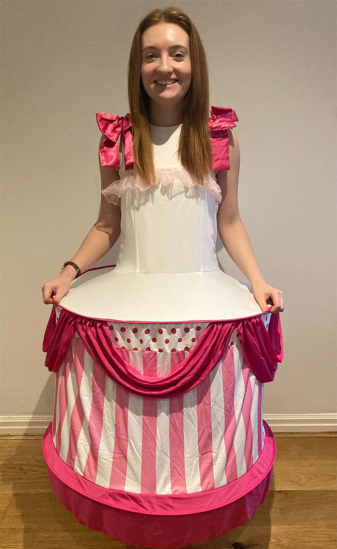 Laura Baker is running the London Marathon in a wedding cake costume (Guinness World Records/PA)