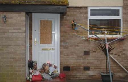 Floral tributes outside the house where Valerie Twyman lived. Picture: BARRY GOODWIN