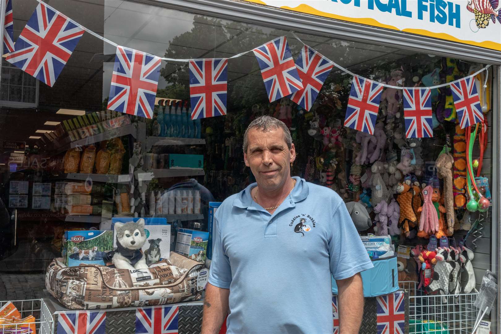 Alex Smith outside his pet shop Cuddles and Bubbles. Picture: SWNS/Gwyn Wright