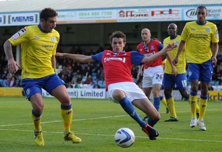 Tom Flanagan puts in a tackle