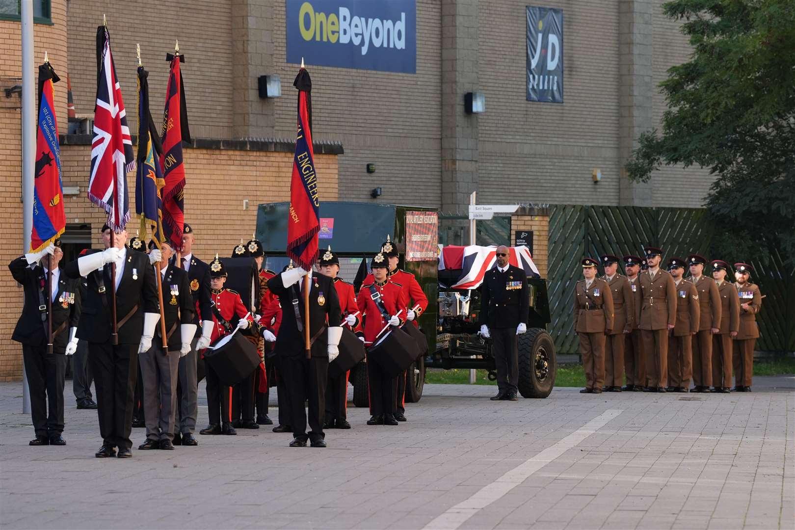 The coffin is escorted by members of the armed forces and veterans to St Martin’s Church in Basildon (Lucy North/PA)