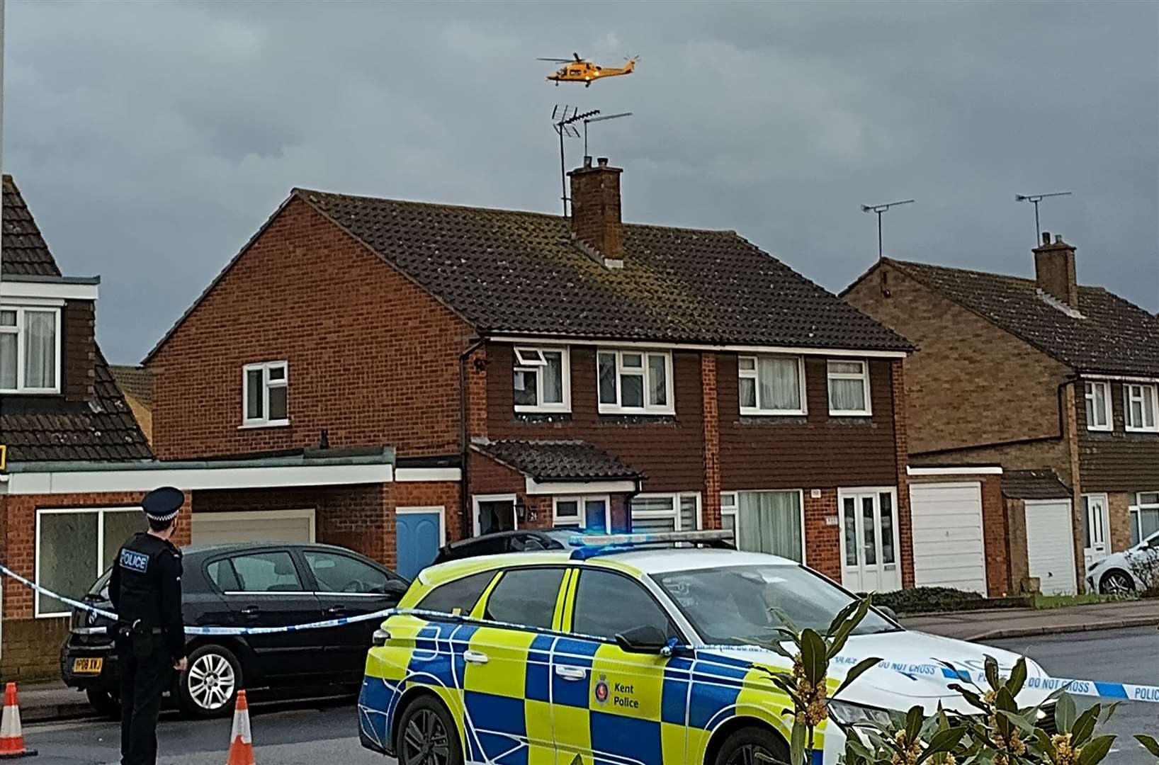 The closed road with the air ambulance approaching