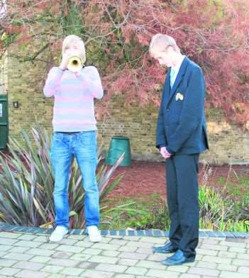 Oliver Cole remembers his great-great-uncle, while fellow Oakwood Park Grammar School pupil Matt Sweeting plays the Last Post during the school's Remembrance festivities