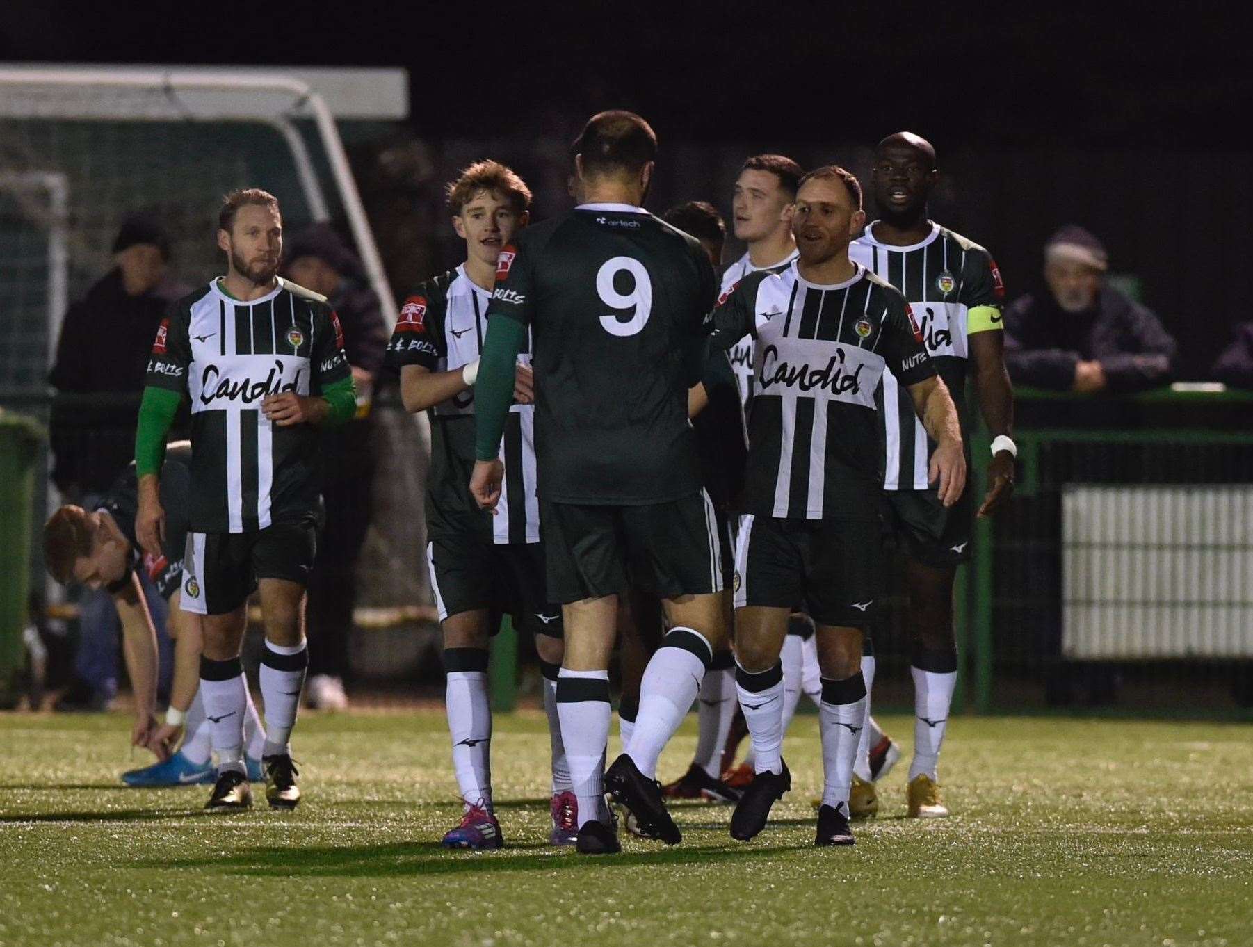 Barry Fuller, second from right, celebrates after giving Ashford the lead in midweek. Picture: Ian Scammell