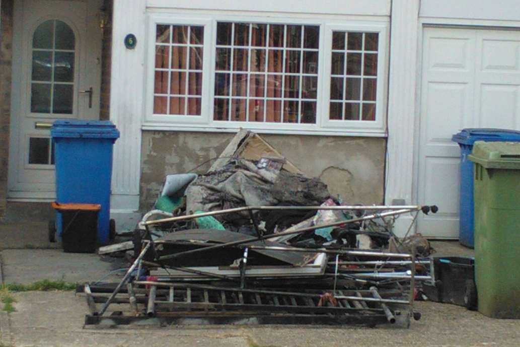 Rubble outside a house Sittingbourne after a blaze