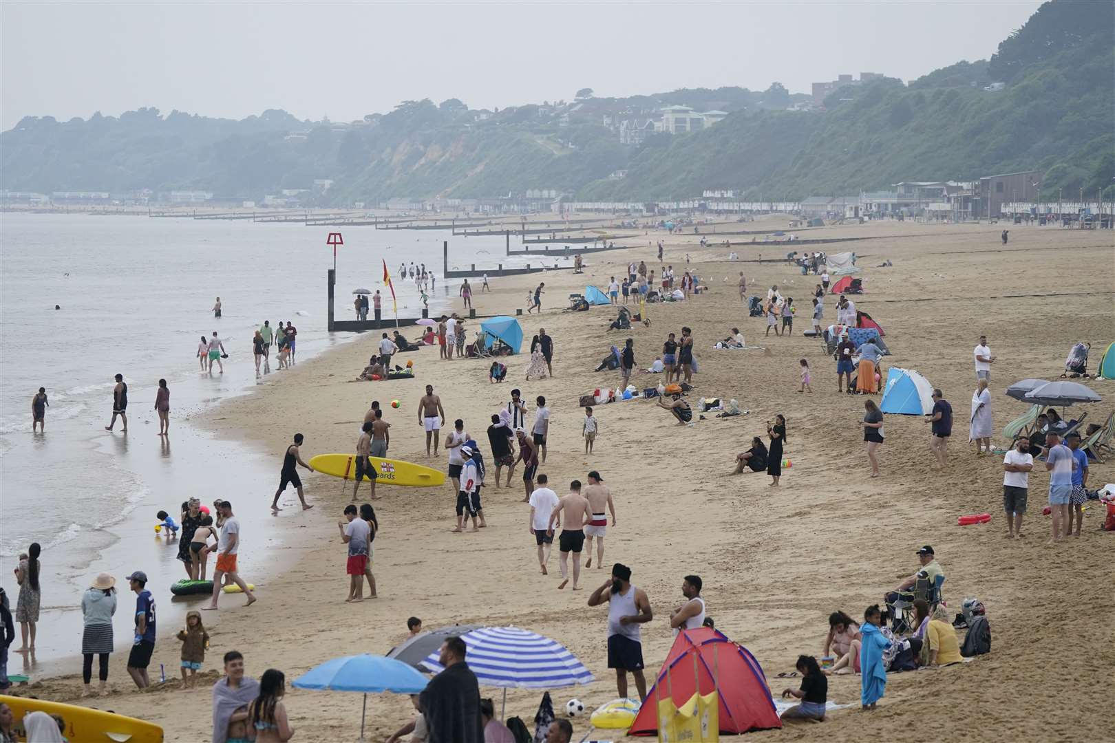 Beachgoers at Bournemouth beach in Dorset (Andrew Matthews/PA)