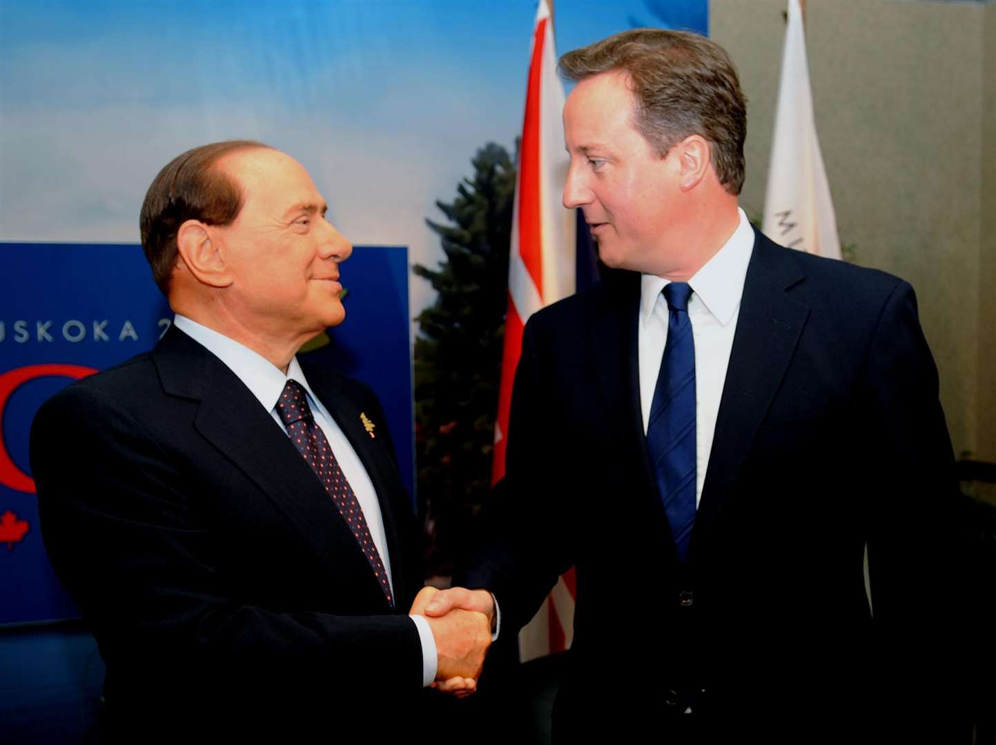 Former prime minister David Cameron with Mr Berlusconi (Stefan Rousseau/PA)