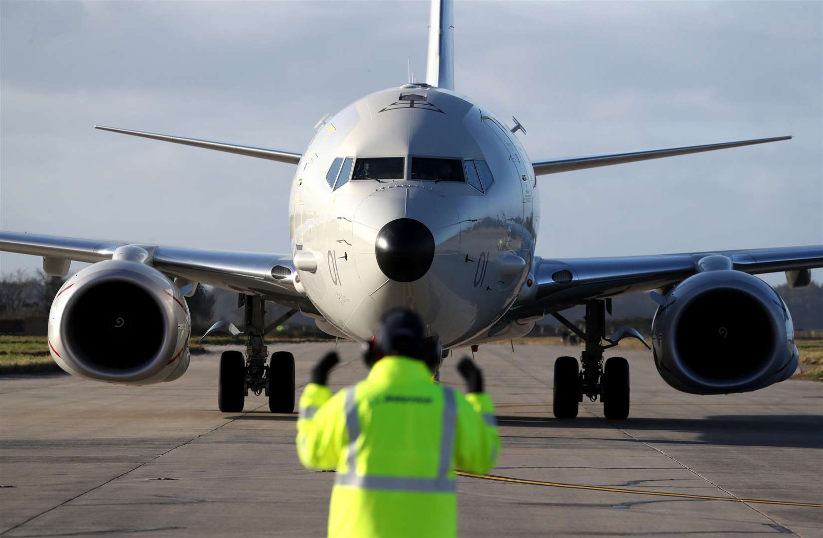 The UK’s first submarine-hunting P-8A Poseidon maritime patrol aircraft as it arrived at the Kinloss Barracks in Moray (Andrew Milligan/PA)