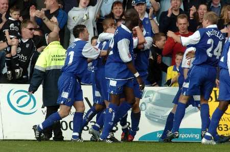 POINT PROVED: Gillingham players celebrate Nicky Southall's goal. Picture: GRANT FALVEY