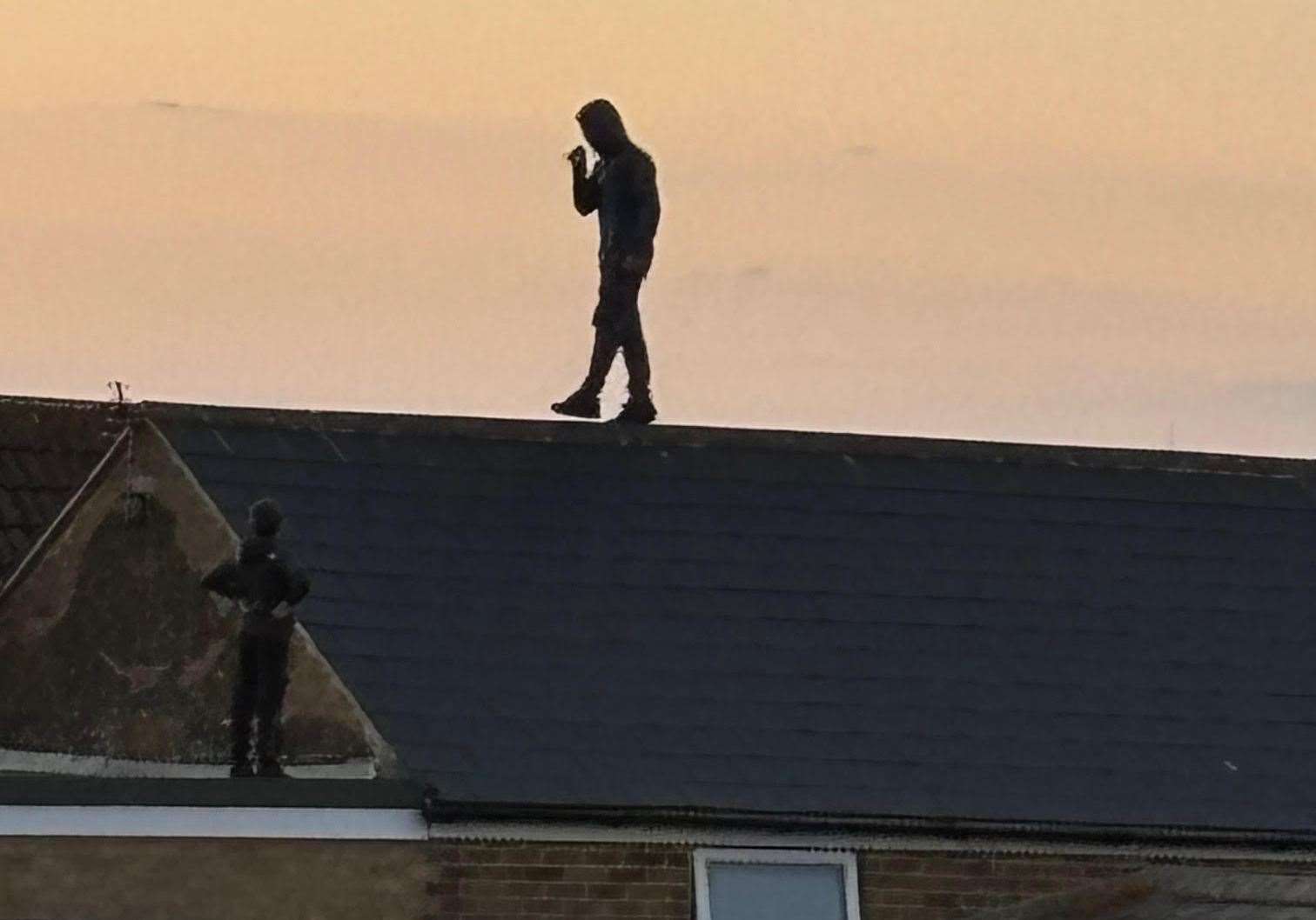 A child walks on the sloping roof at the Mill Road site in Deal, as a pal looks on. Submitted picture