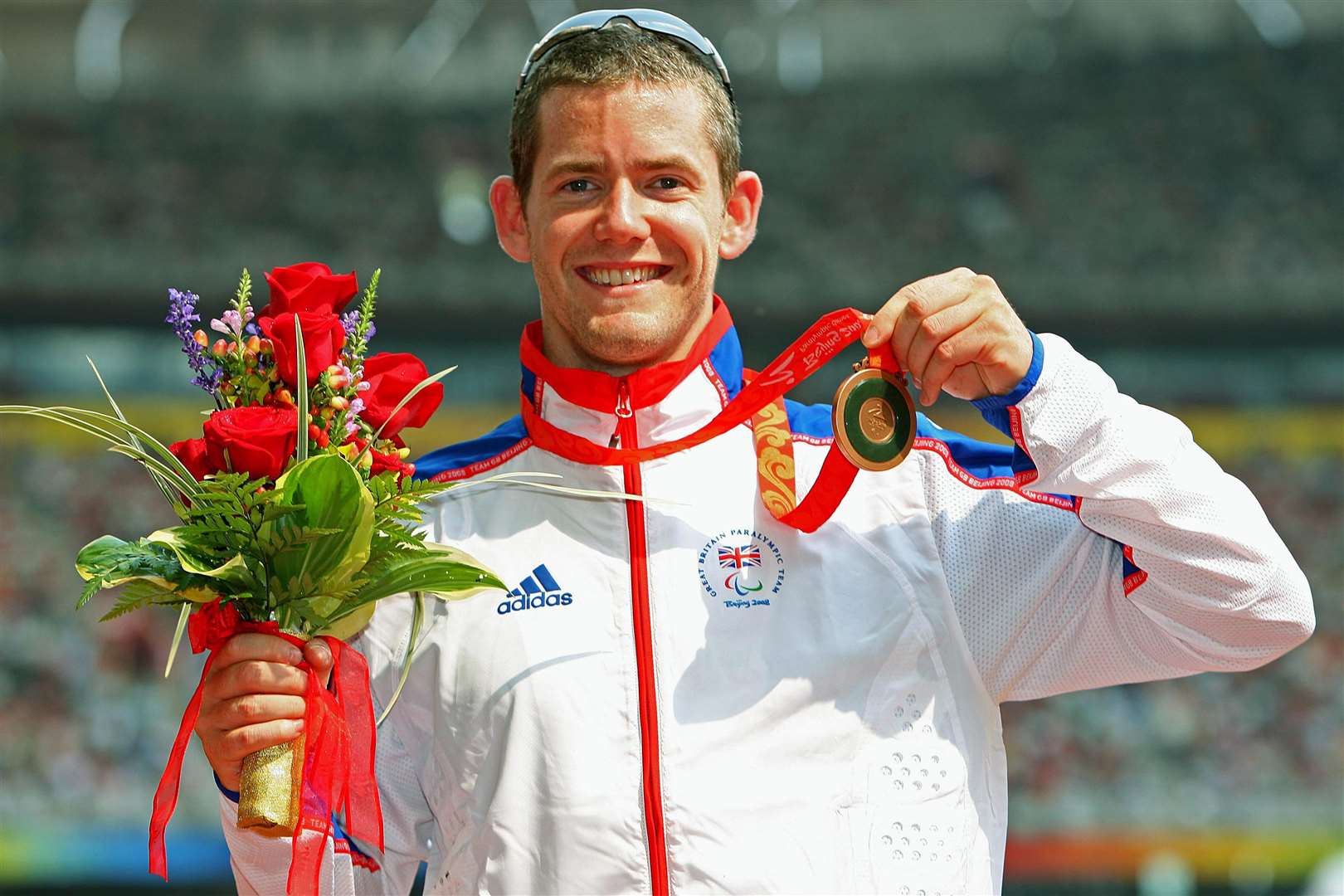 John McFall won a bronze medal in the 100m at the Beijing 2008 Paralympic Games (PA)