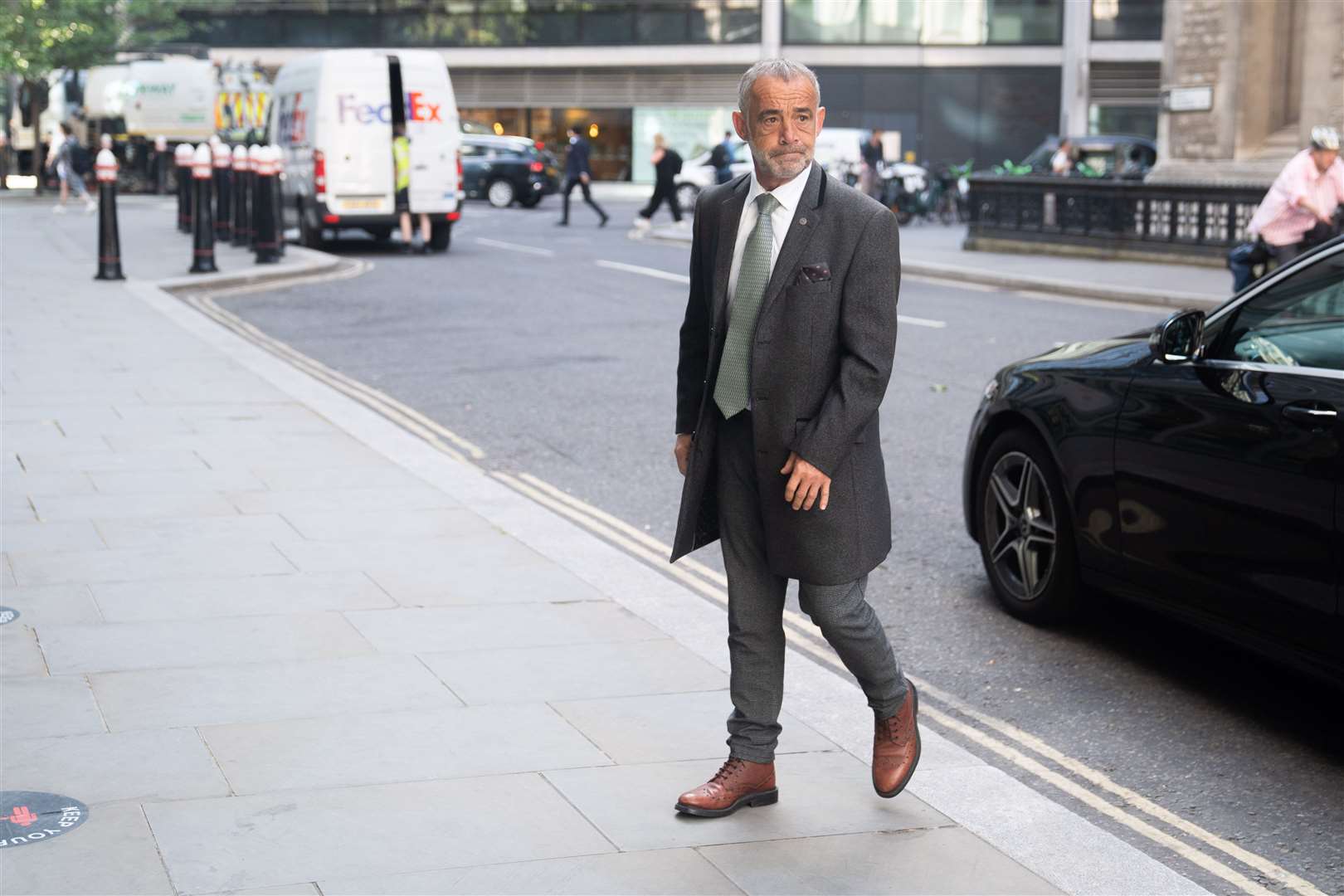 Michael Le Vell arrives at the Rolls Buildings in central London for the phone hacking trial against Mirror Group Newspapers (James Manning/PA)