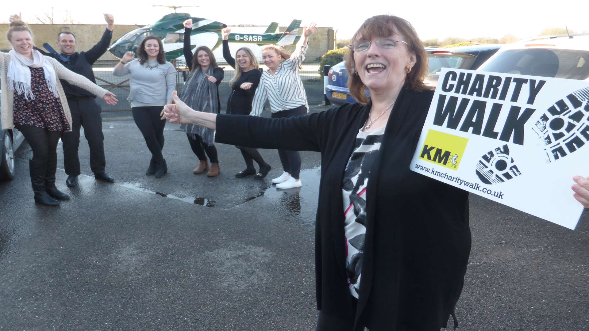 Bridget Pepper and staff at Kent, Surrey and Sussex Air Ambulance celebrate partnership with the KM Charity Team ahead of the 21st annual Charity Walk event.