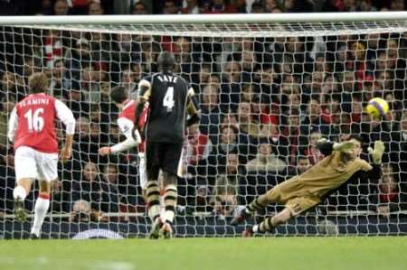 Robin Van Persie converts his second half penalty. Picture: MATT WALKER