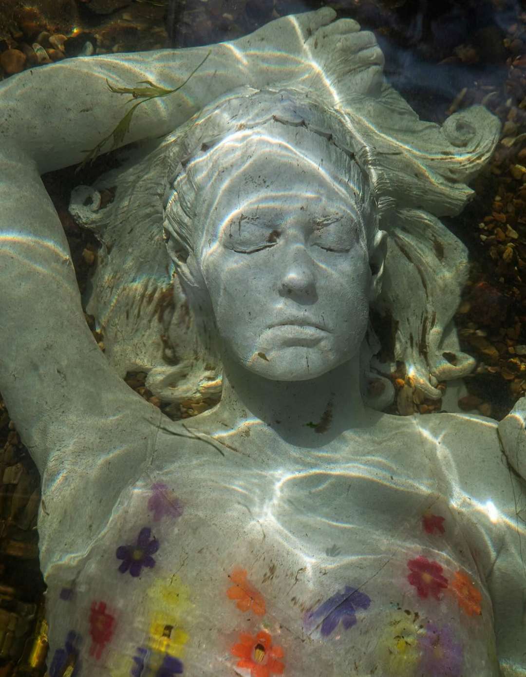 The eerily-beautiful but controversial new Alluvia created by Jason deCaires Taylor in the Stour in Canterbury