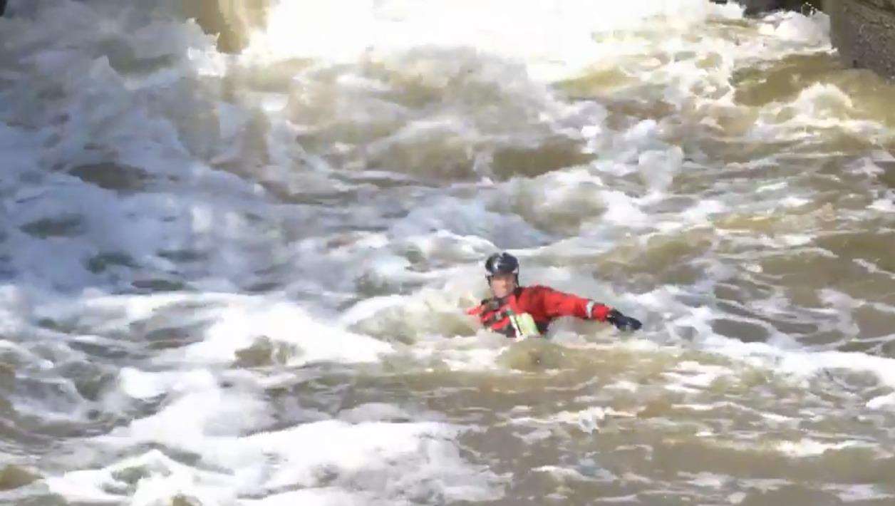 Fire safety instructor Chris Kendall demonstrated the strength of the river at Yalding