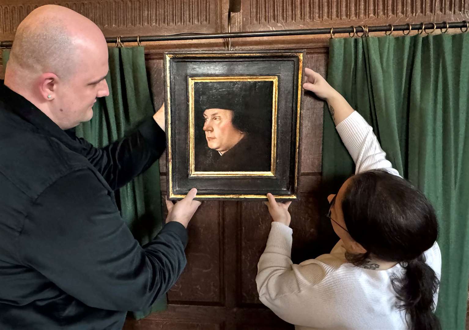 Thomas Cromwell’s portrait unveiled by curator Alison Palmer and assistant curator Dr Owen Emmerson at Hever Castle. Photo Vikki Rimmer