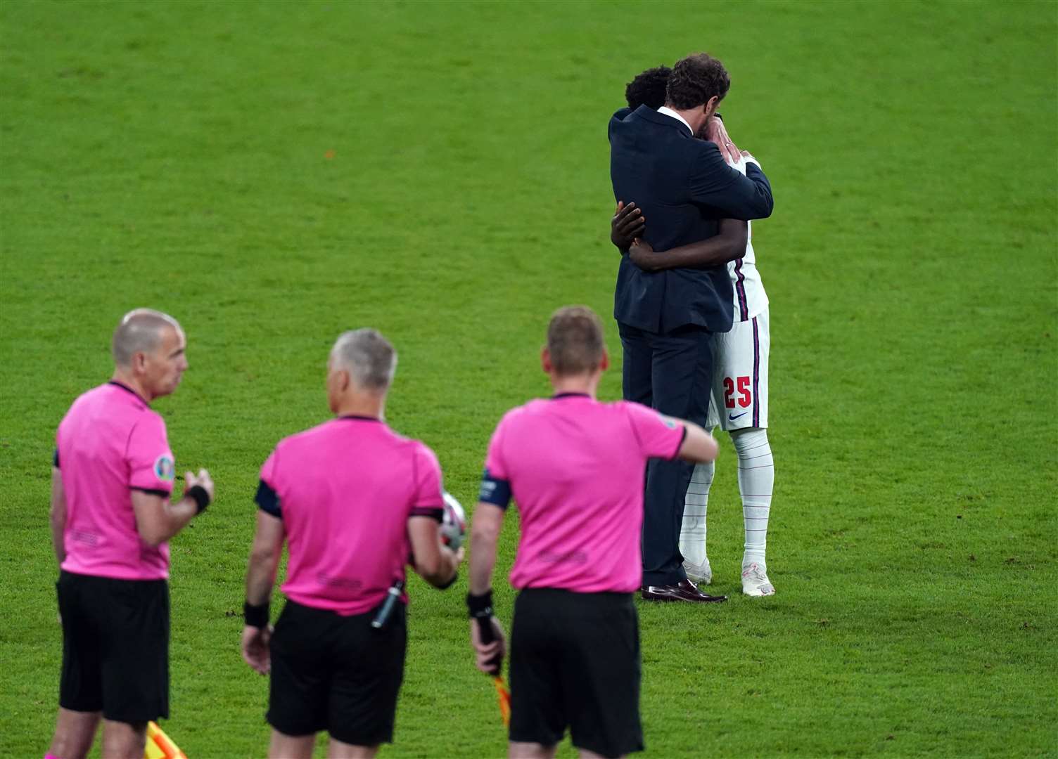 England manager Gareth Southgate consoled Saka after the penalty shoot out (Mike Egerton/PA)