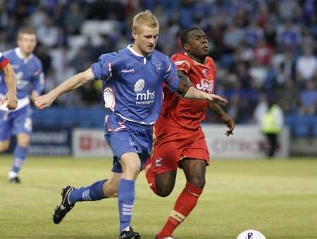 Gary Mulligan tries to beat a Scunthorpe defender. Picture: PETER STILL