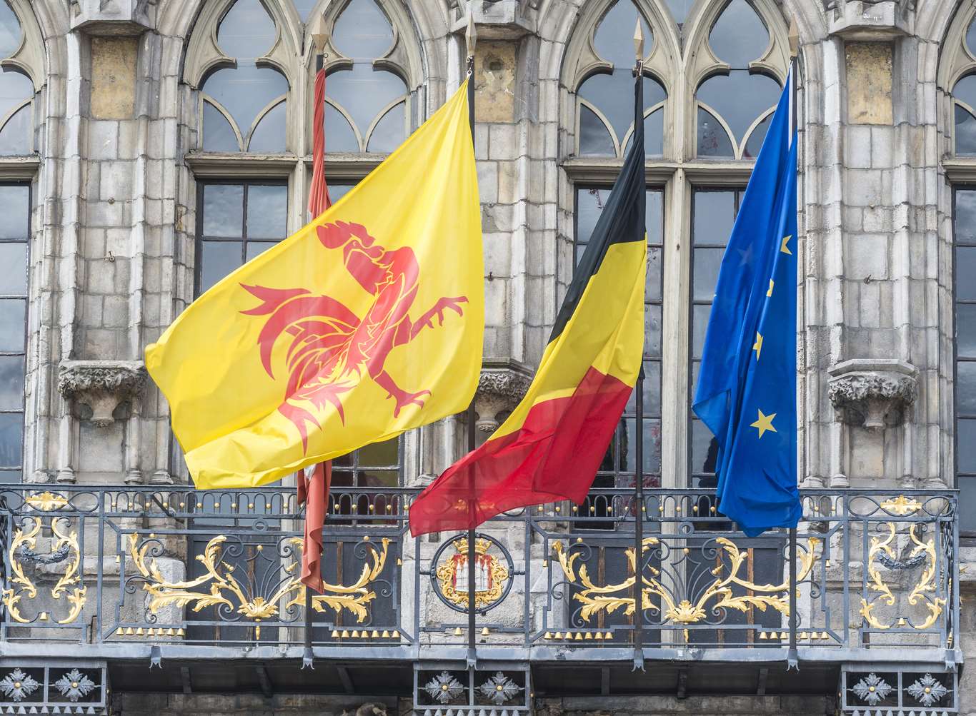 Flags on the town hall in Mons