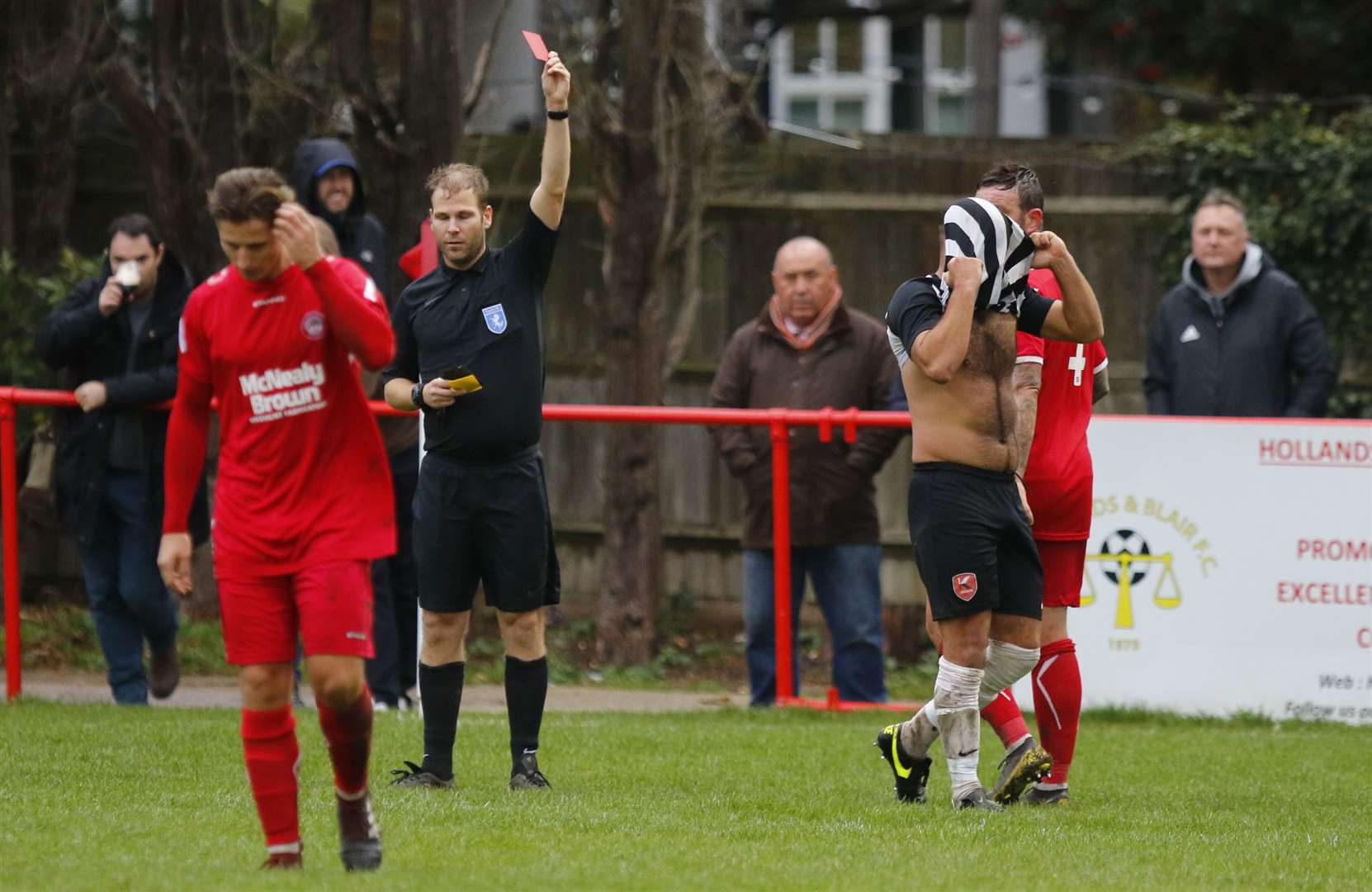 K Sports' Phillip Abbott is given his marching orders against Hollands & Blair. Picture: Barry Goodwin (42843452)