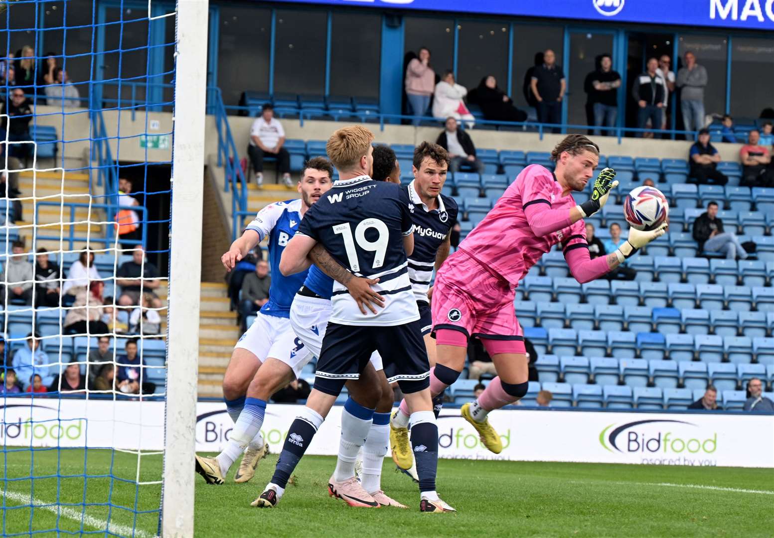 Millwall keeper Lukas Jensen in action as he claims the ball Picture: Barry Goodwin