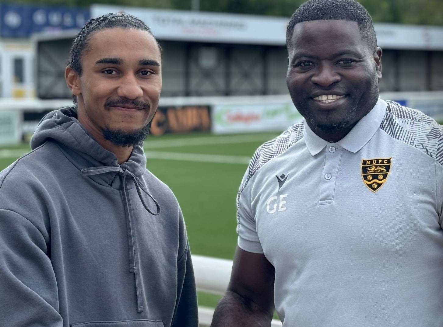 Maidstone United manager George Elokobi, right, welcomes new signing Aaron Blair. Picture: MUFC